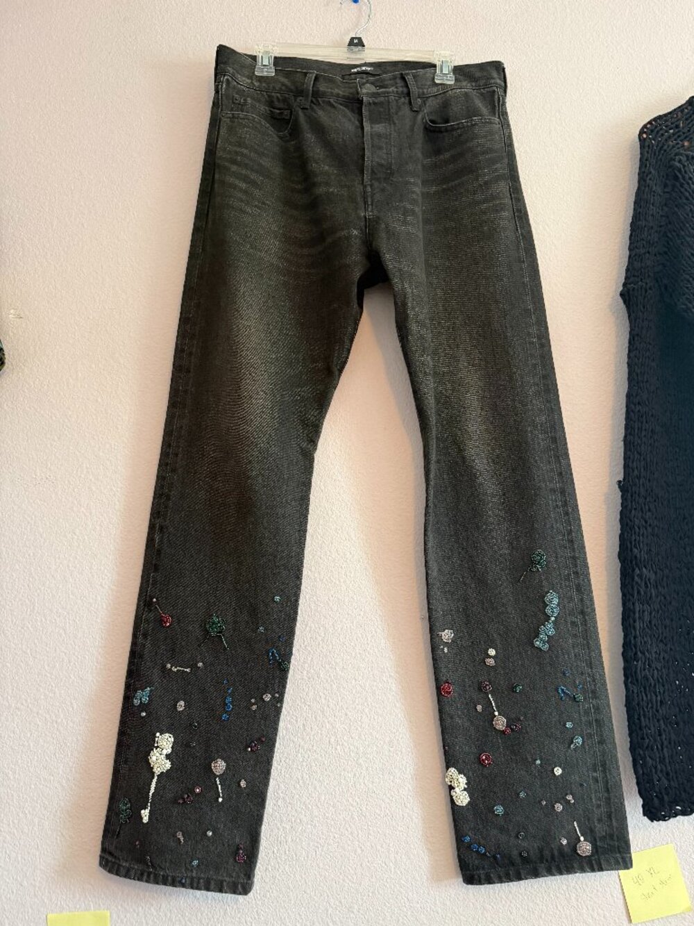 Black Jeans with Colorful Beaded Embellishments on Lower Legs